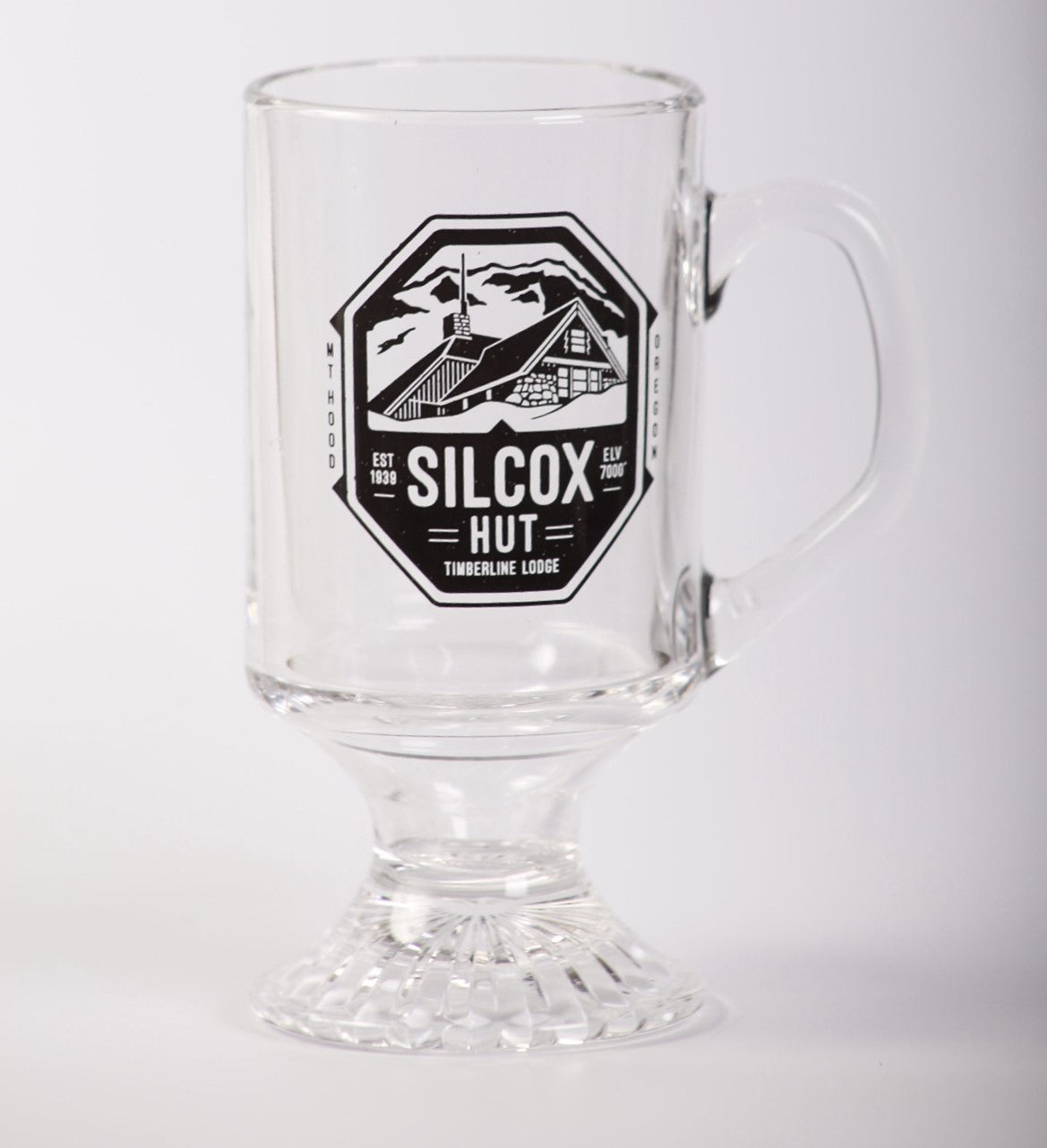 Clear glass mug with a black logo on a white background