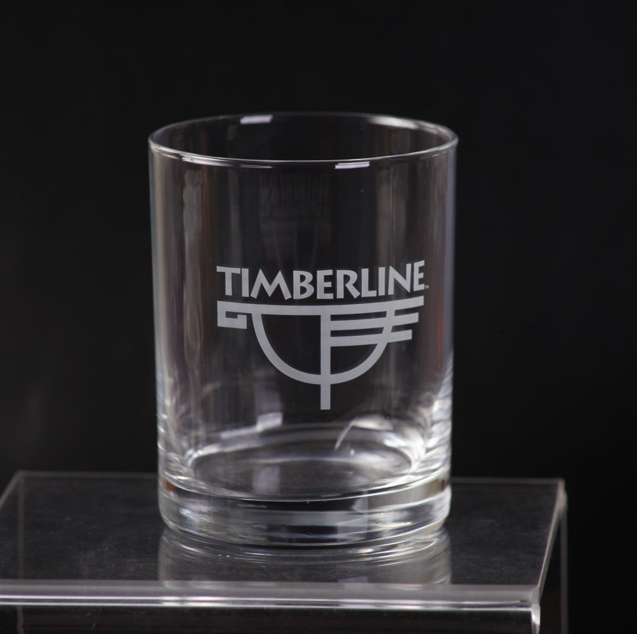 Clear glass with 'Timberline' logo on a black background