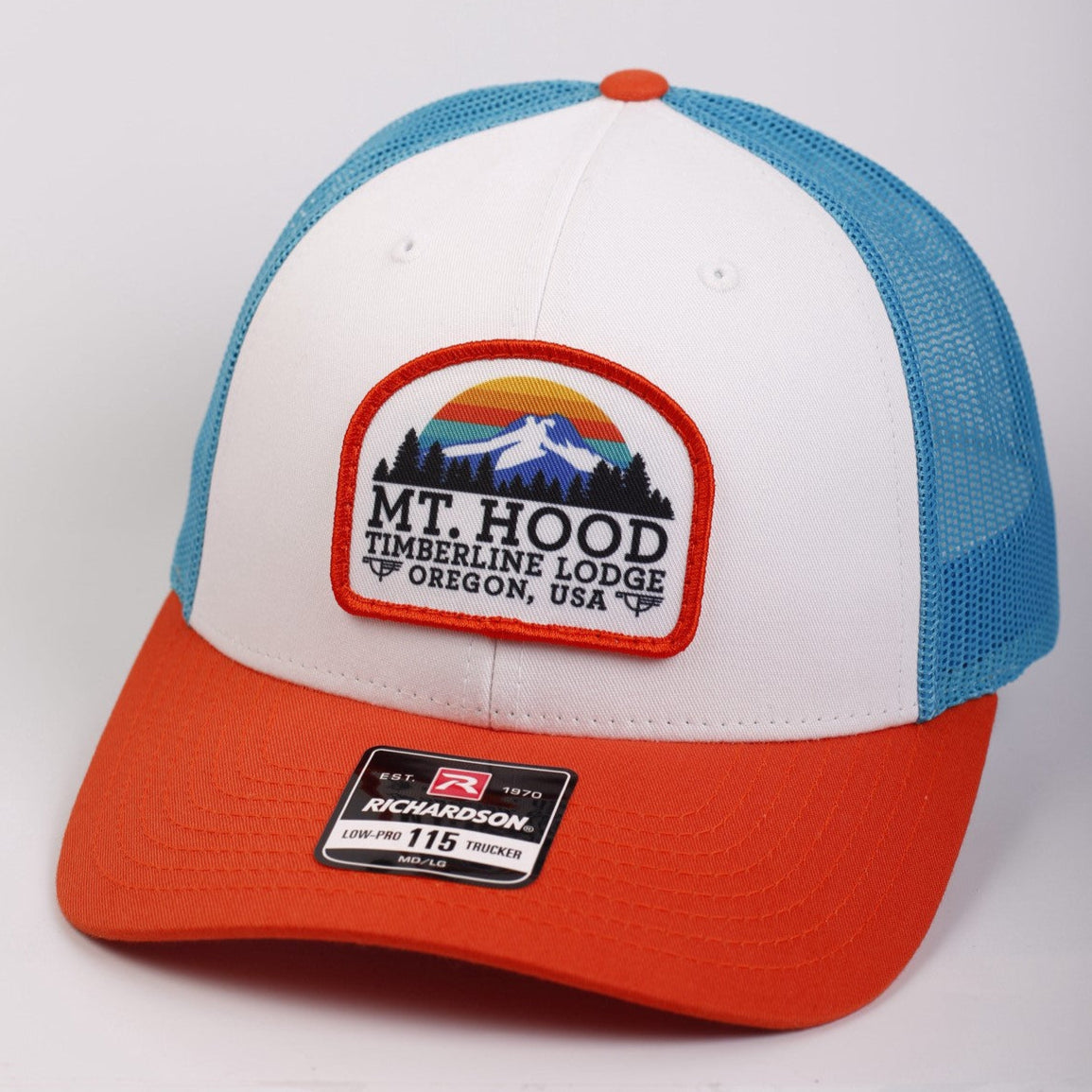 Cap with Mt. Hood Timberline Lodge patch on a white background