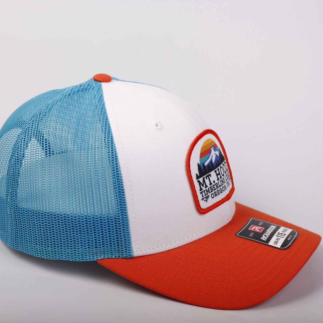 Cap with Mt. Hood Timberline Lodge patch on a white background