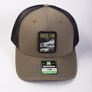 Brown cap with black mesh back and 'Overlook' patch on a white background
