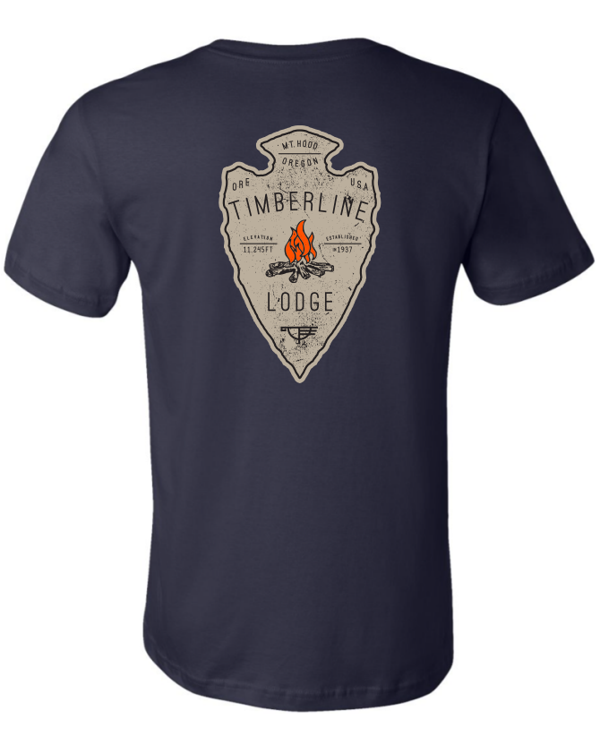 Navy blue tee shirt featuring a vintage-style Timberline Lodge Arrowhead Fire emblem with an illustration of a mountain and trees.
